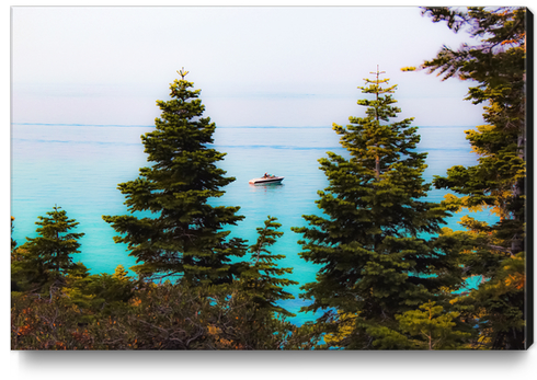 boat on the lake at Emerald bay Lake Tahoe California USA Canvas Print by Timmy333