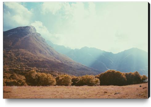 Mountains in the background v Canvas Print by Salvatore Russolillo