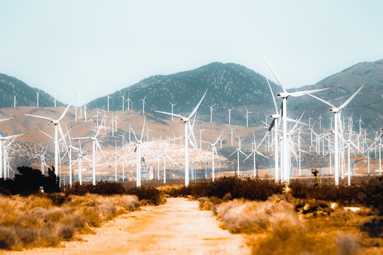 Wind turbine in the desert with mountain background at Kern County California USA  by Timmy333