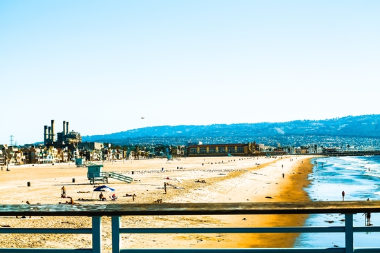 sandy beach with blue ocean wave at Manhattan Beach, California, USA by Timmy333