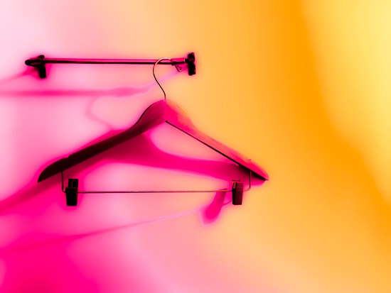 wood hanger with pink and orange wall background by Timmy333