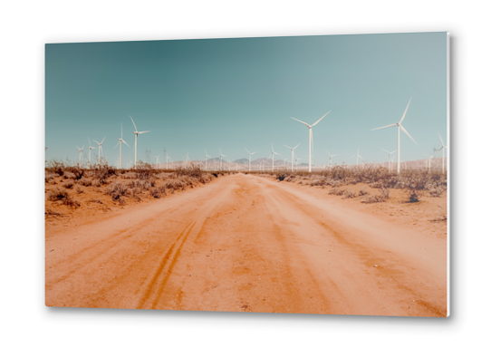 Wind turbine in the desert with sandy road at Kern County California USA Metal prints by Timmy333