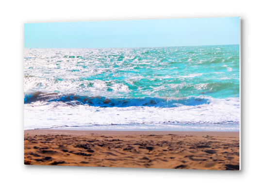 sandy beach with blue water and blue sky in summer Metal prints by Timmy333