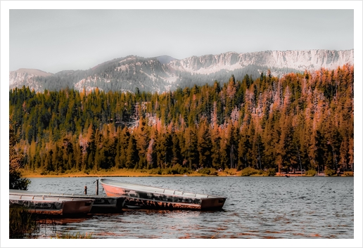 Boat on the lake with pine tree and mountain view background at Mammoth Lakes California USA Art Print by Timmy333