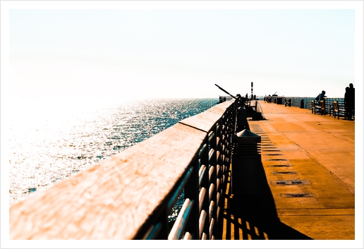 Pier with blue sky at Manhattan Beach, California, USA Art Print by Timmy333