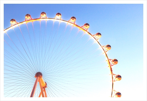 orange Ferris Wheel in the city with blue sky  Art Print by Timmy333