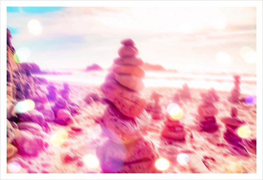 stone balancing at the sandy beach with summer bokeh light Art Print by Timmy333