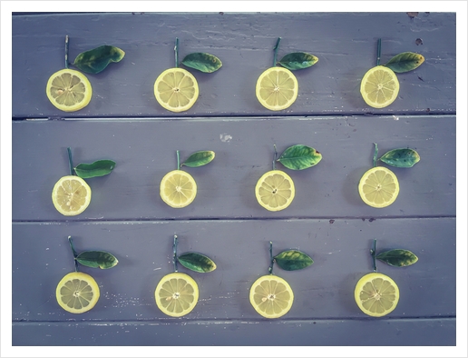 pieces of lemon on the wooden table Art Print by Timmy333