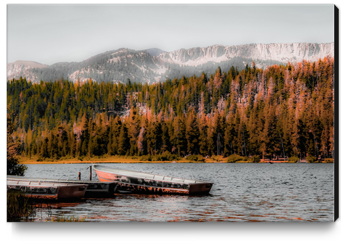 Boat on the lake with pine tree and mountain view background at Mammoth Lakes California USA Canvas Print by Timmy333