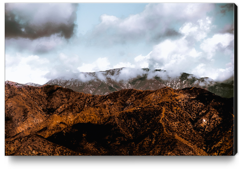 View from the hiking trail with mountain view and blue cloudy sky to Hollywood sign Los Angeles California USA Canvas Print by Timmy333