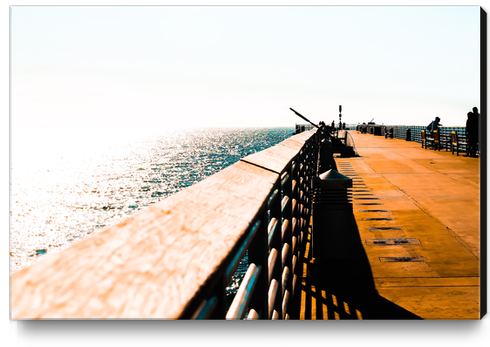 Pier with blue sky at Manhattan Beach, California, USA Canvas Print by Timmy333