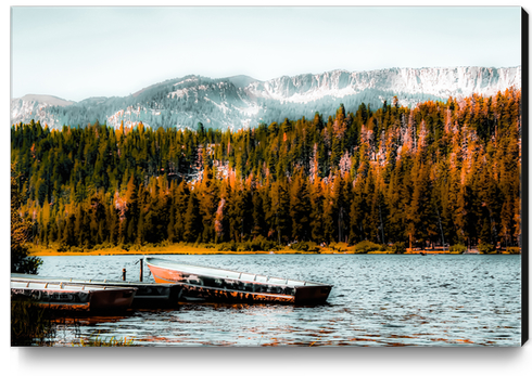 boat on the lake with pine tree and mountain background at Mammoth Lakes, California, USA Canvas Print by Timmy333