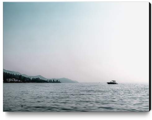 boat on the water with blue sky at Lake Tahoe USA Canvas Print by Timmy333