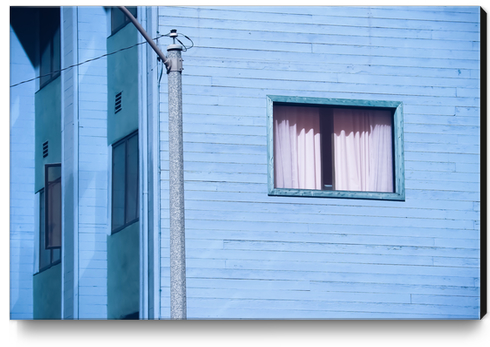 vintage blue wood building with window and electric pole Canvas Print by Timmy333