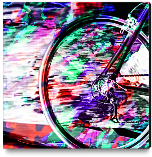 bicycle wheel with colorful abstract background in green red and purple Canvas Print by Timmy333