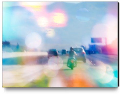 car and motorcycle on the road in the city with bokeh light Canvas Print by Timmy333