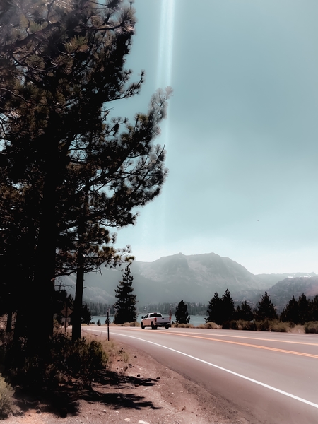 Road with pine tree and mountain view at Mammoth Lakes California by Timmy333