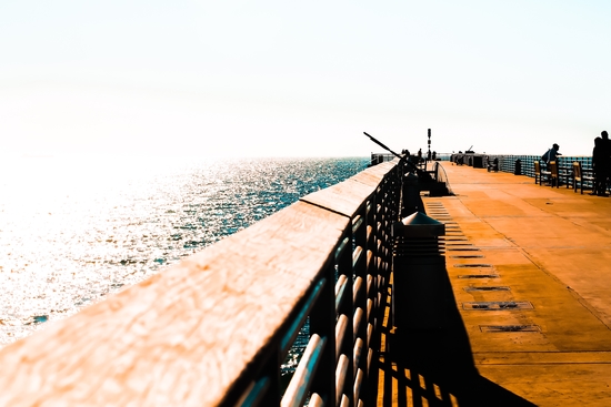 Pier with blue sky at Manhattan Beach, California, USA by Timmy333