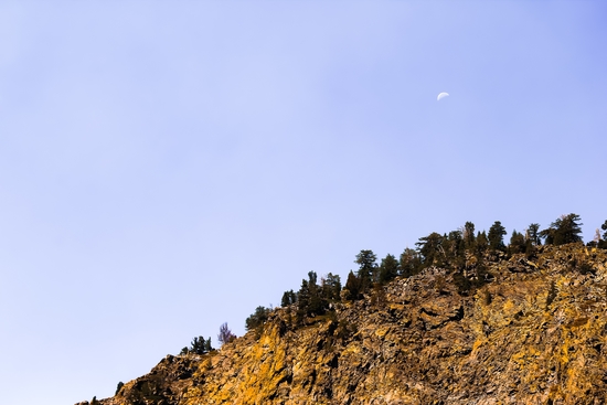 Moon and mountain with clear blue sky at Lake Tahoe, California, USA by Timmy333