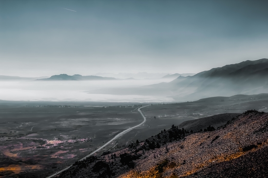 mountains layer with foggy blue sky in California USA by Timmy333