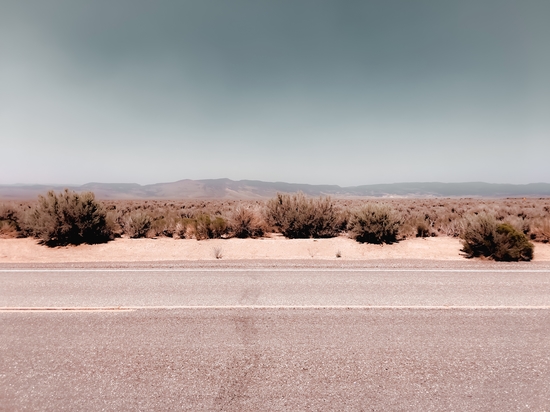 Road in the desert with blue sky in California USA by Timmy333