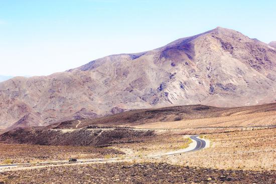 road in the middle of the desert at Death Valley national park, USA by Timmy333