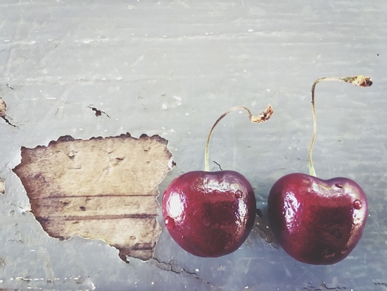 fresh cherry on the wooden table by Timmy333